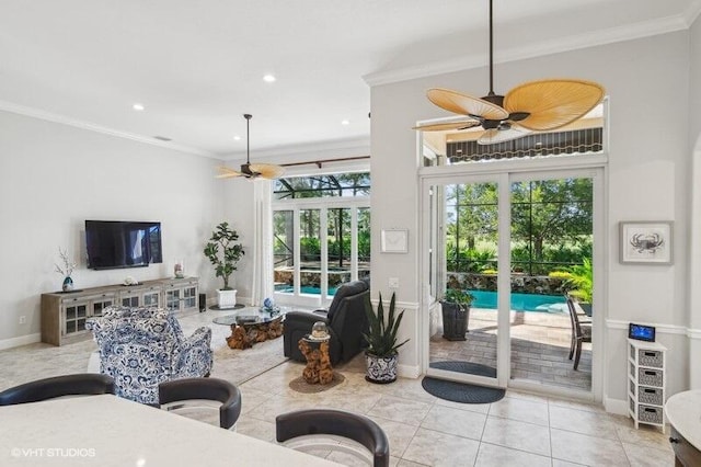 living room with crown molding, light tile patterned floors, and ceiling fan