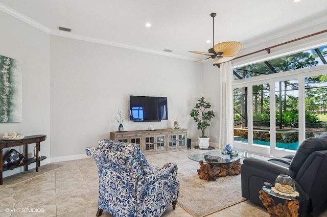 living room featuring crown molding, ceiling fan, and light tile patterned floors