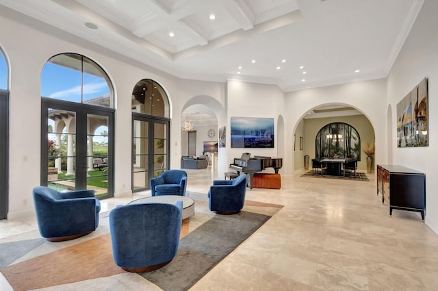 living room with a high ceiling, coffered ceiling, a notable chandelier, french doors, and beamed ceiling