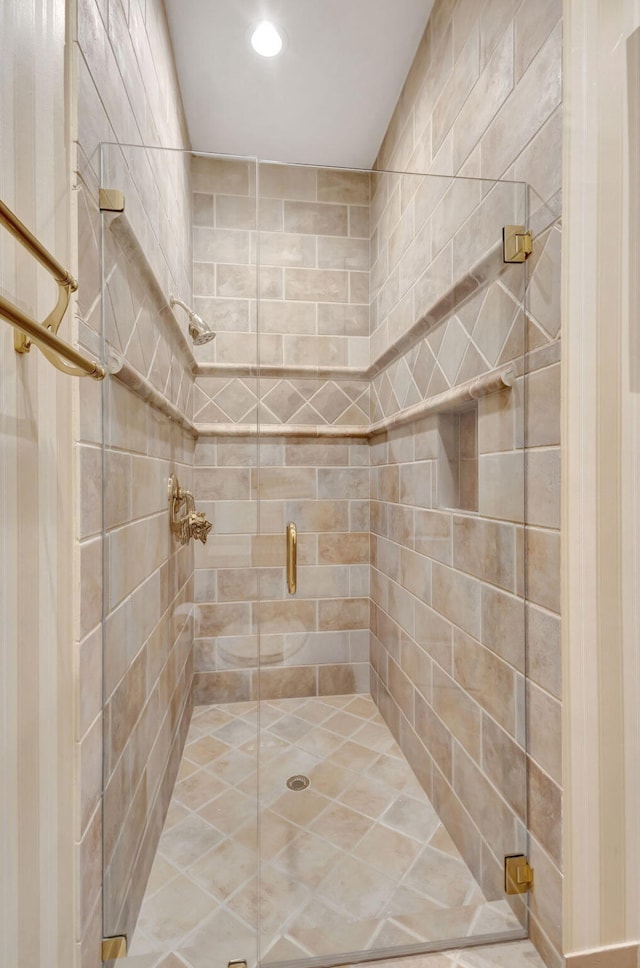 bathroom featuring an enclosed shower