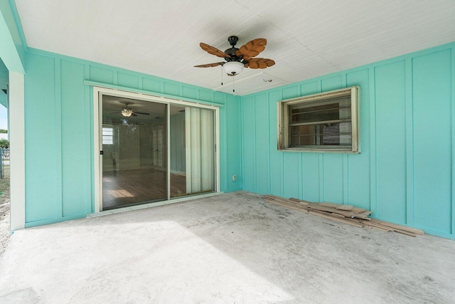 view of patio featuring ceiling fan