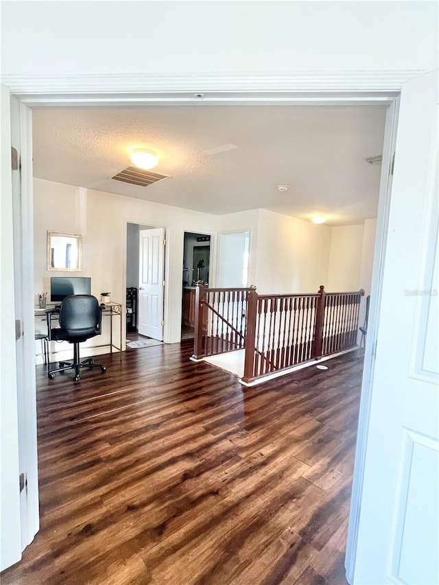 hall featuring dark hardwood / wood-style floors