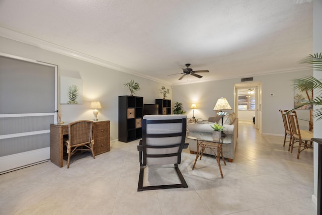 living room featuring ornamental molding, light tile patterned floors, and ceiling fan