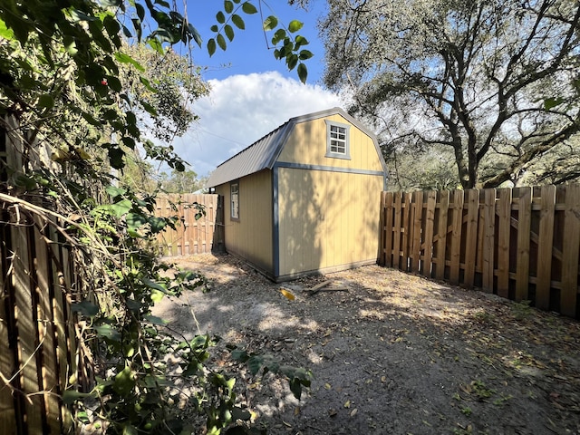 view of shed featuring a fenced backyard