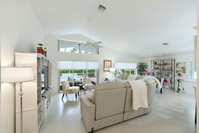 living room with light tile patterned floors, crown molding, vaulted ceiling, and ceiling fan