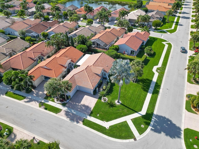 bird's eye view with a water view