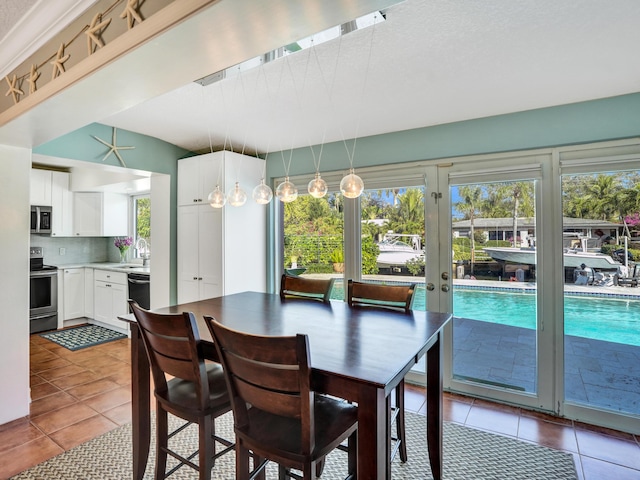 tiled dining space with sink