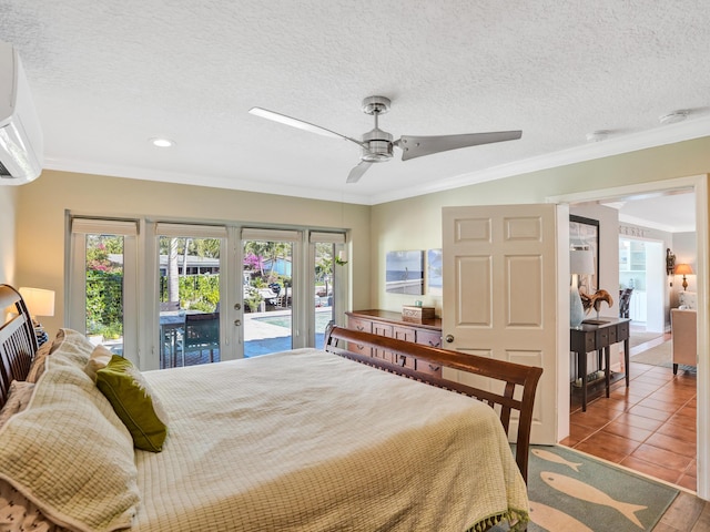 bedroom featuring light tile patterned flooring, ornamental molding, access to outside, and a textured ceiling