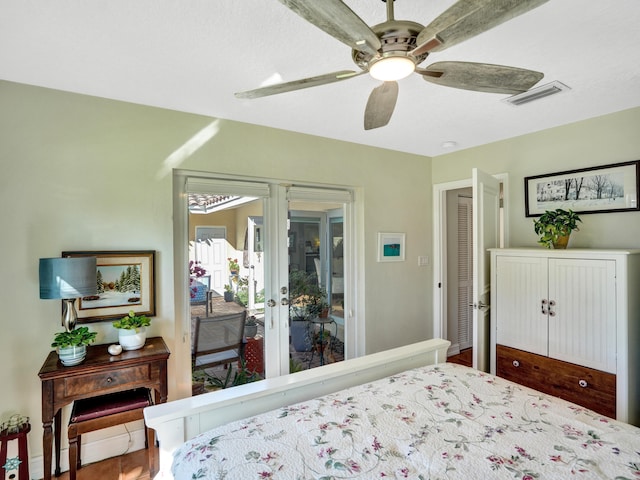 bedroom with ceiling fan and french doors