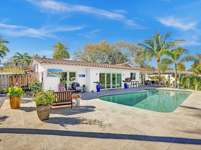 view of swimming pool featuring a patio