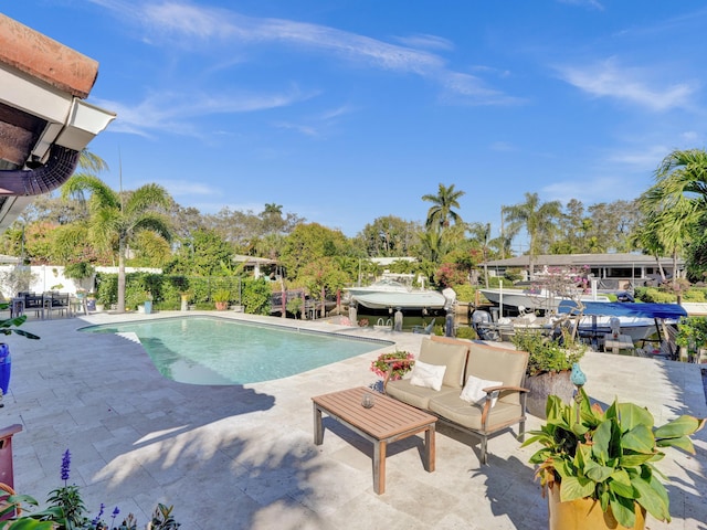 view of pool with a patio area and outdoor lounge area