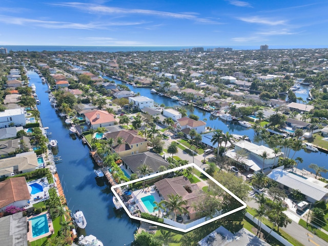 bird's eye view with a water view