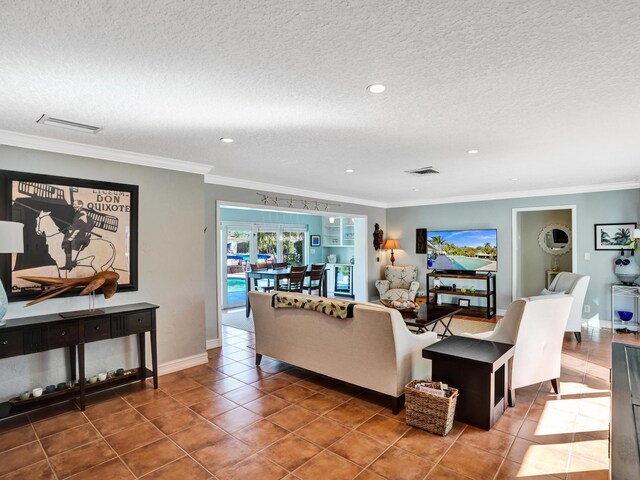 living room featuring tile patterned flooring and a textured ceiling