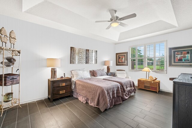 bathroom with tile patterned flooring, vanity, and plus walk in shower