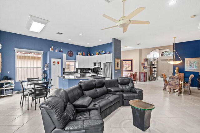 living room with tile patterned floors