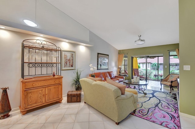 tiled living room featuring lofted ceiling