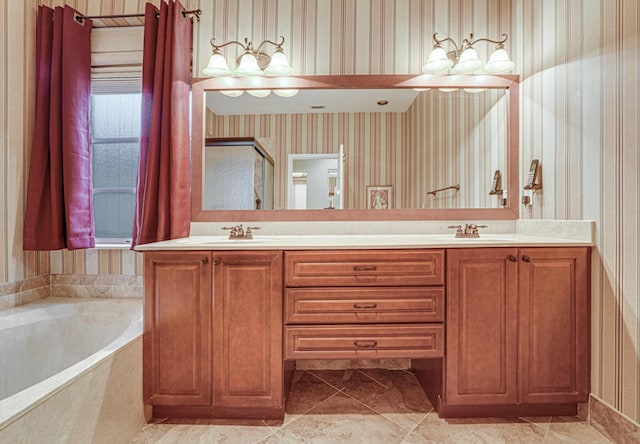 bathroom with independent shower and bath and vanity