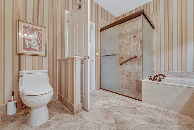 bathroom with toilet and shower with separate bathtub