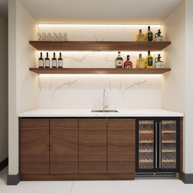 bar featuring sink, tile patterned floors, and wine cooler