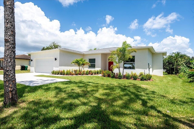 view of front of house featuring a front yard and a garage