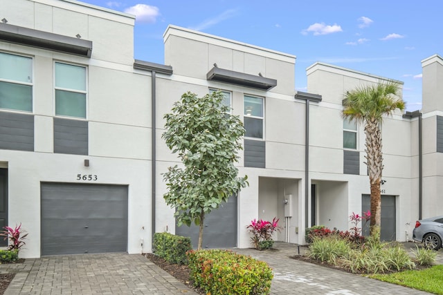 view of property featuring a garage