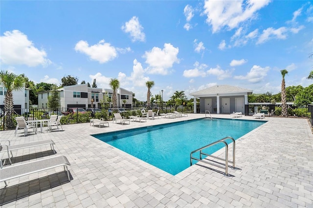 view of pool featuring a patio area