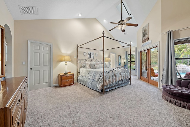 carpeted bedroom with ceiling fan, high vaulted ceiling, french doors, and access to outside