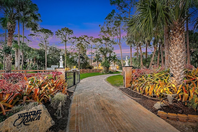 view of property's community featuring a yard