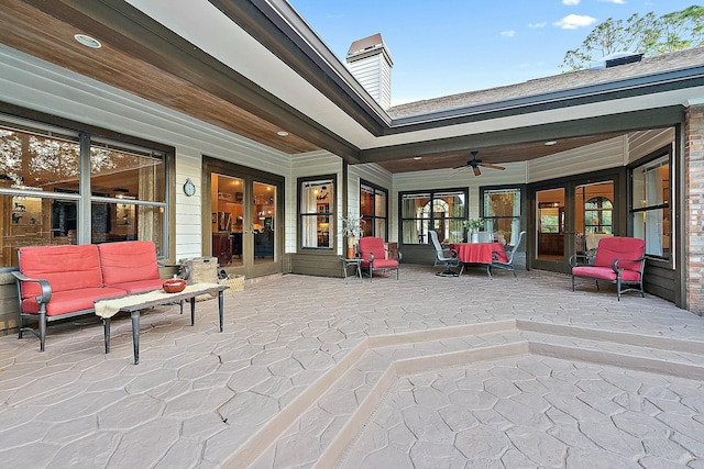 view of patio / terrace featuring french doors, a ceiling fan, and an outdoor hangout area