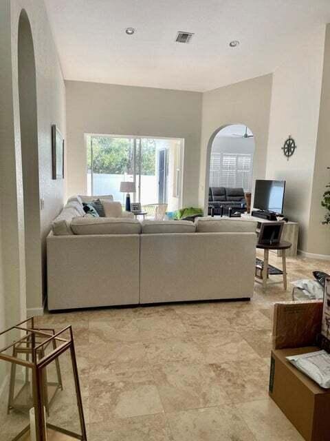 living room featuring plenty of natural light