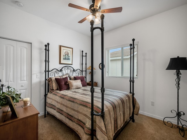 bedroom with a closet, ceiling fan, and carpet floors