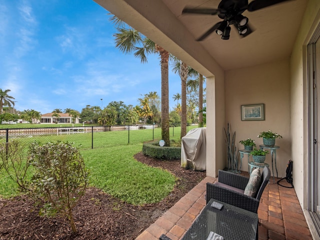 view of yard featuring ceiling fan