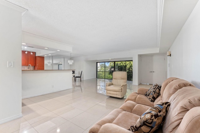 living room with a textured ceiling and light tile patterned flooring