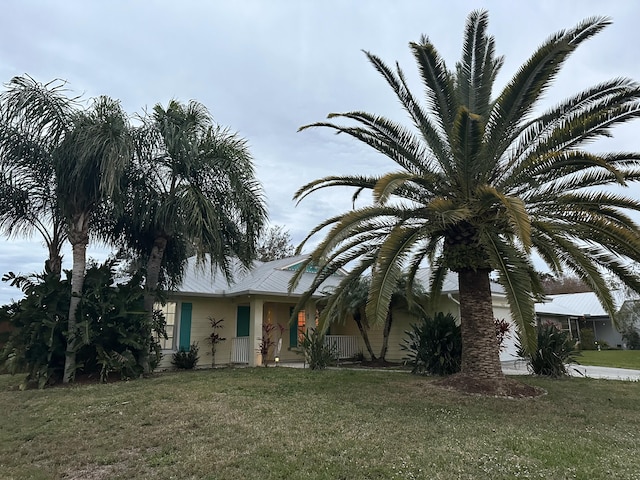 view of front of home with a front yard