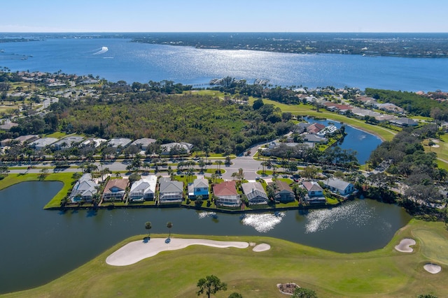 1401 SE Glencoe Ct, Port Saint Lucie, FL 34952 - drone / aerial view featuring a water view, view of golf course, and a residential view