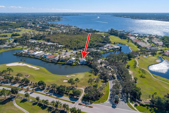 1401 SE Glencoe Ct, Port Saint Lucie, FL 34952 - drone / aerial view featuring a residential view, view of golf course, and a water view