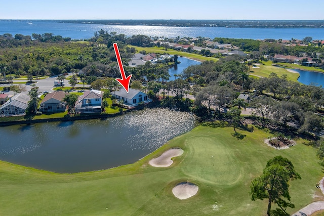 1401 SE Glencoe Ct, Port Saint Lucie, FL 34952 - bird's eye view featuring a water view, view of golf course, and a residential view