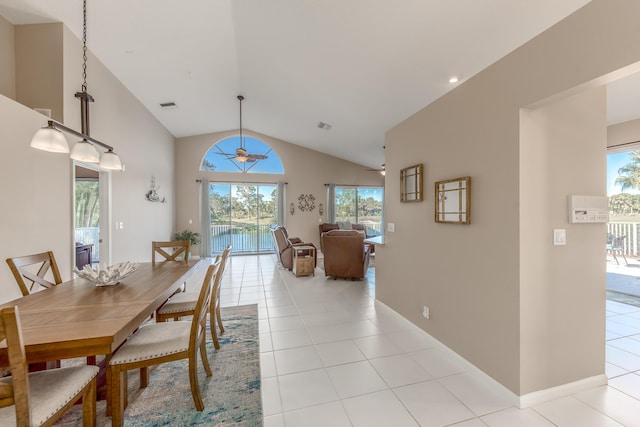 1401 SE Glencoe Ct, Port Saint Lucie, FL 34952 - dining space with light tile patterned floors, plenty of natural light, visible vents, and lofted ceiling