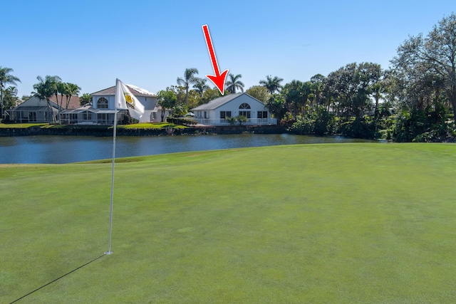 1401 SE Glencoe Ct, Port Saint Lucie, FL 34952 - view of community with a yard, a water view, and golf course view