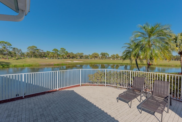 1401 SE Glencoe Ct, Port Saint Lucie, FL 34952 - view of patio featuring a water view
