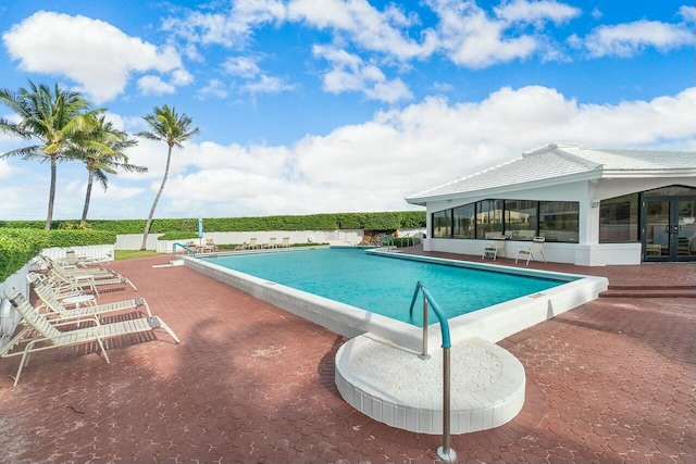 view of pool featuring a patio area