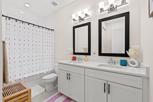 full bathroom with toilet, shower / bathtub combination with curtain, tile patterned floors, and vanity