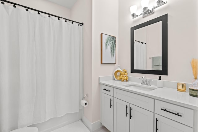 bathroom featuring vanity and shower / tub combo