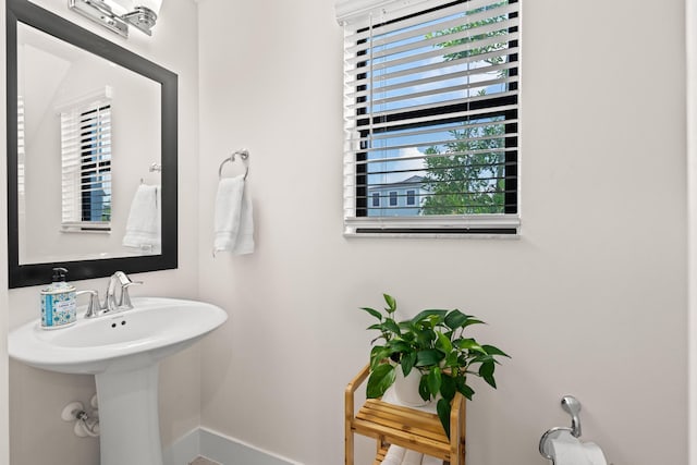 bathroom with a healthy amount of sunlight and sink