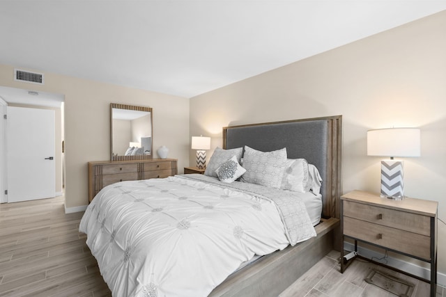 bedroom featuring light hardwood / wood-style flooring