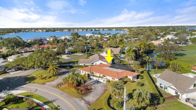 drone / aerial view featuring a water view