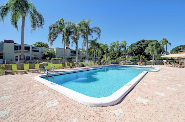 view of pool featuring a patio