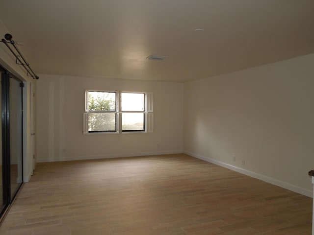 empty room featuring light hardwood / wood-style flooring