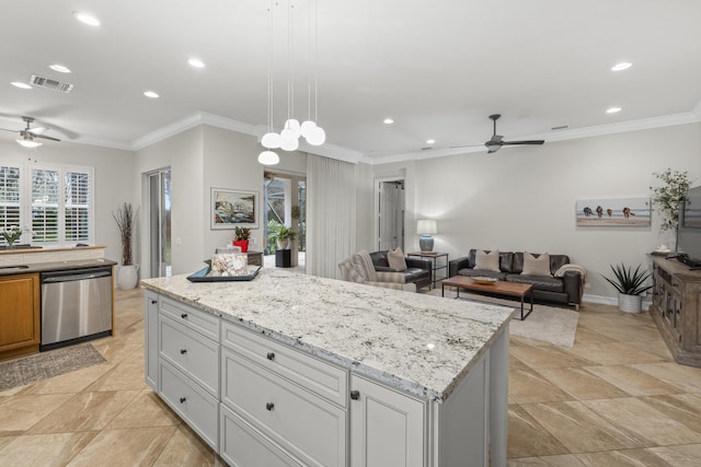 kitchen with white cabinetry, hanging light fixtures, a center island, ornamental molding, and stainless steel dishwasher