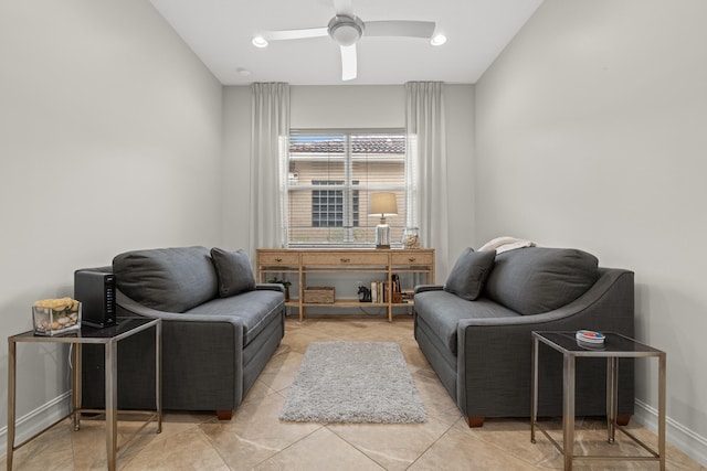 living area featuring ceiling fan